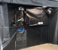QFA001: UV lamp support, wall mount, with articulated head shown Magnaflux EV6000.